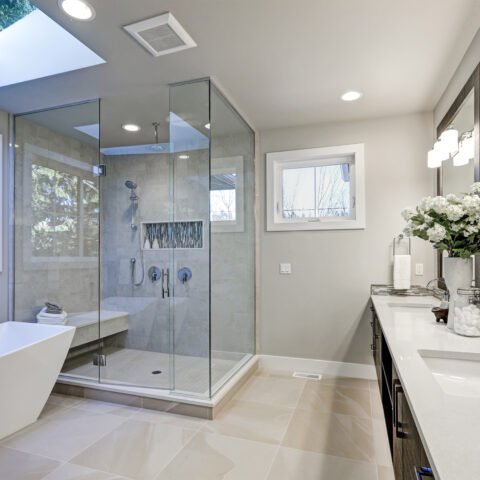 Spacious,Bathroom,In,Gray,Tones,With,Heated,Floors,,Freestanding,Tub,