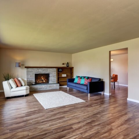 Modern,Living,Room,Interior,With,Fireplace,And,Hardwood,Floor.,Northwest,